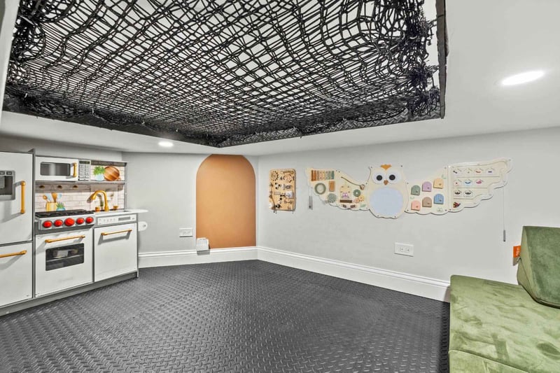 family-focused basement remodel with interactive play space and custom recreational features by Skor Construction in Palatine, I-optimized