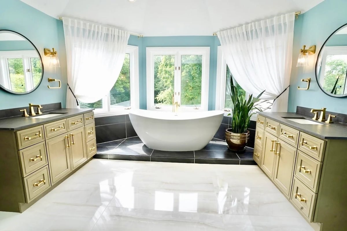 luxurious master bathroom remodeling project in barrington il featuring freestanding soaking tub dual vanities gold fixtures and marble floors by skor construction
