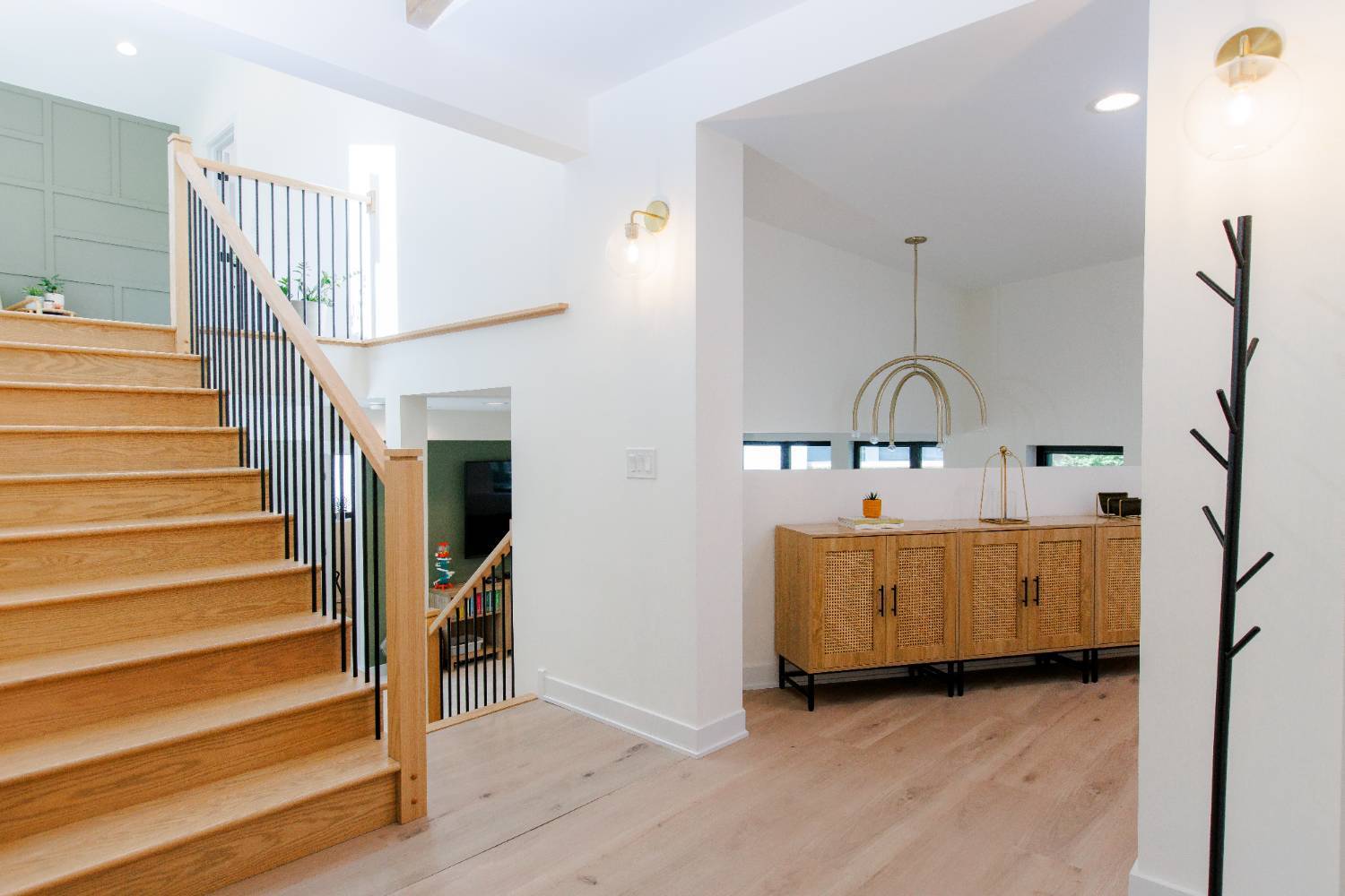 Open-concept stairway and upper-level living space created through a Skor Construction home addition in Palatine, IL.-optimized