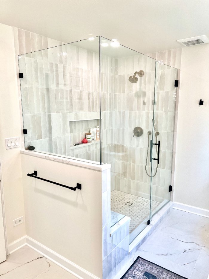 luxury bathroom shower renovation by Skor Construction in Palatine, IL showcasing floor-to-ceiling tile and modern black hardwar-optimized
