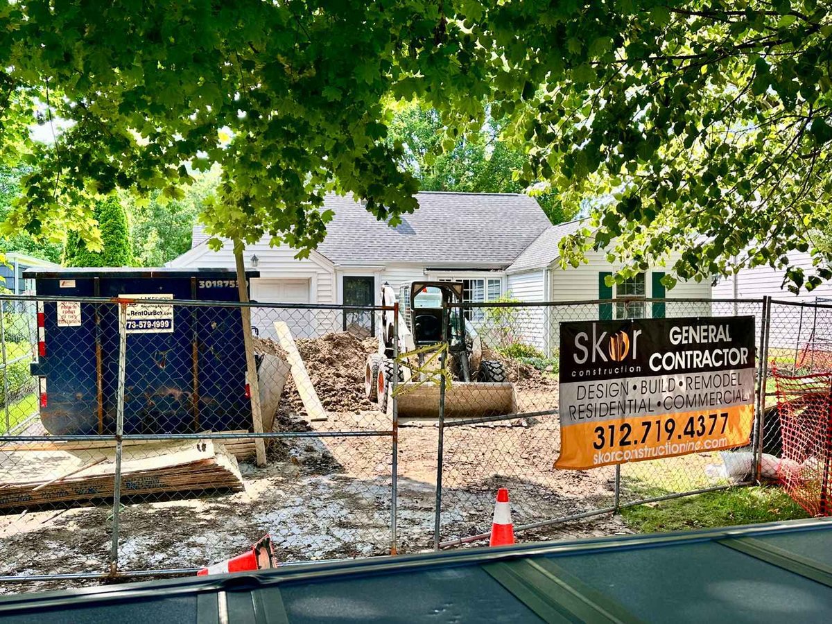 excavation work underway for a residential sunroom addition and patio remodel by Skor Construction in Wilmette, IL.-optimized
