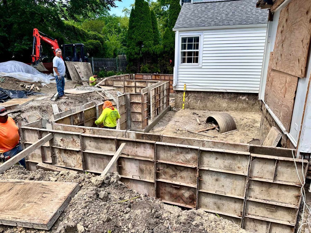 residential addition foundation work in progress by Skor Construction in Wilmette, IL featuring concrete form installation.-optimized