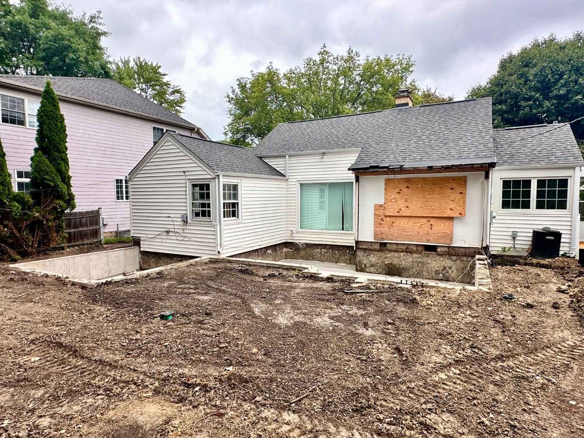 residential construction progress by Skor Construction in Wilmette, IL showing foundation installation for a new sunroom additio-optimized