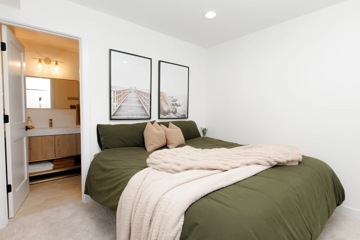 Bedroom remodel with en-suite bathroom as part of home addition in Prospect Heights by SKOR Construction