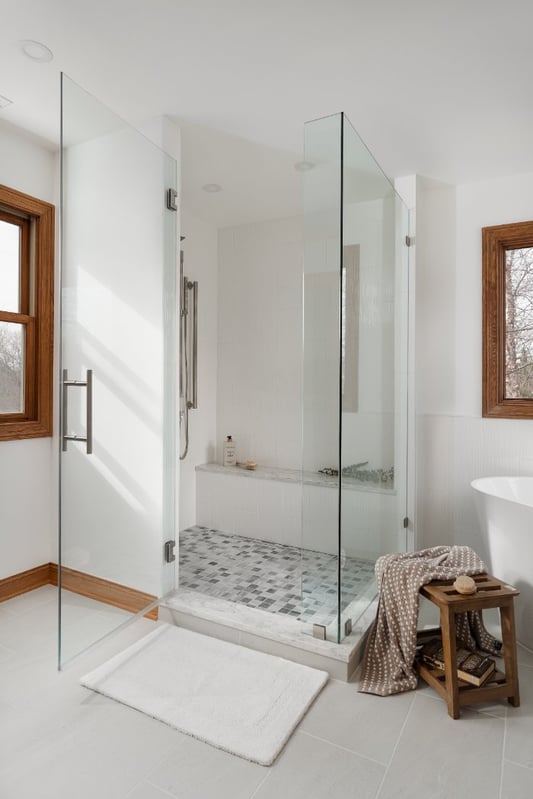 Skor Construction Lauder Primary Bathroom Remodel in Inverness, IL featuring a frameless glass walk-in shower with marble tile f-optimized Skor Construction Lauder Primary Bathroom Remodel in Inverness, IL featuring a frameless glass walk-in shower with marble tile f-optimized