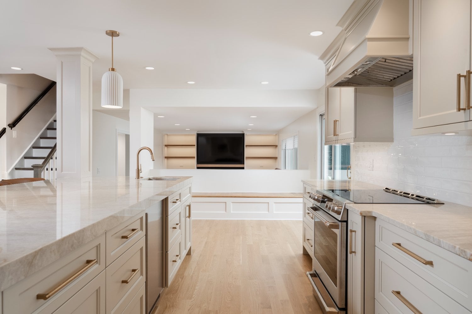 Skor Construction major kitchen-main level renovation in Mount Prospect, IL featuring a bright white kitchen with quartz counter-optimized