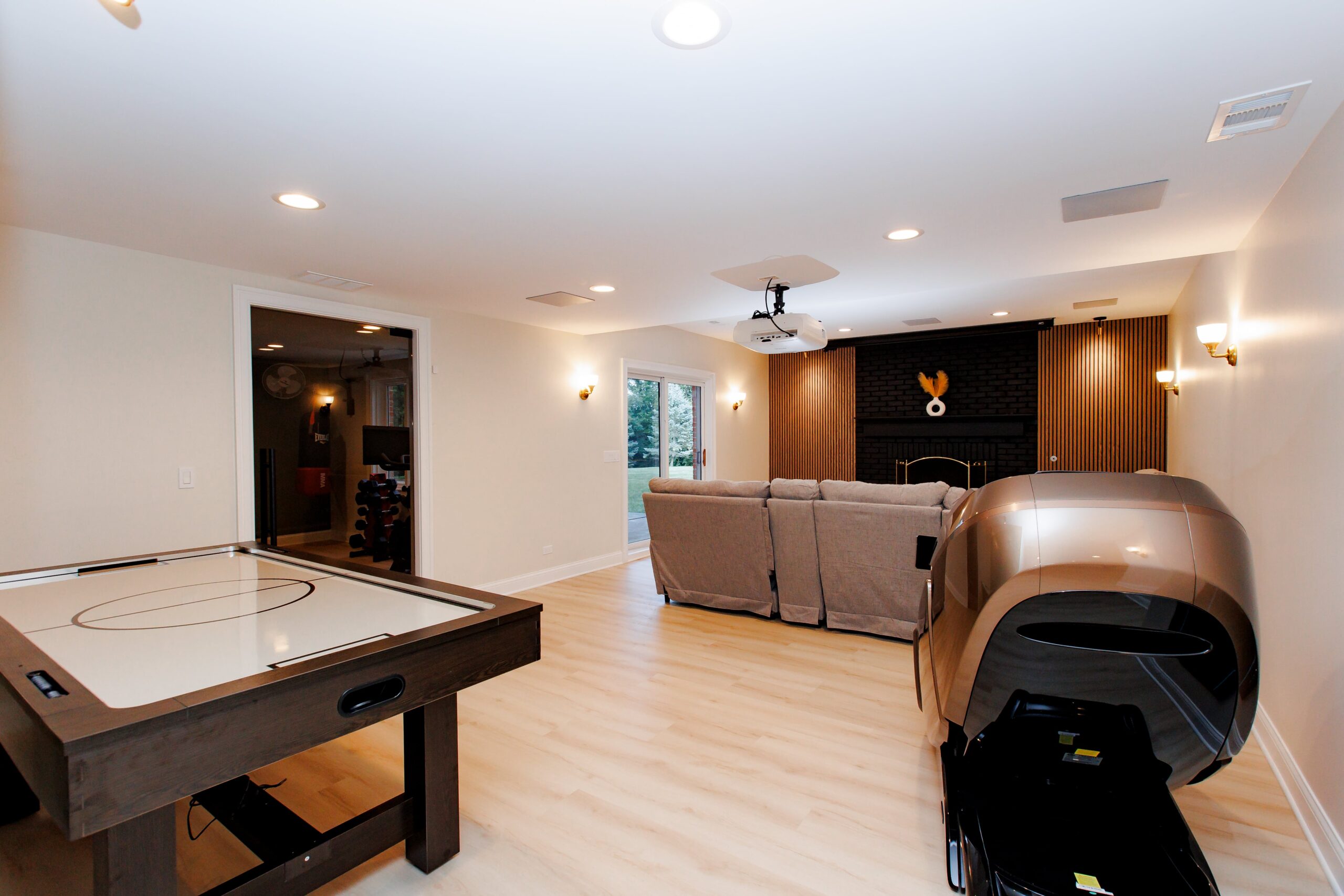 Basement remodel in Patine, IL with arcade space and custom lights