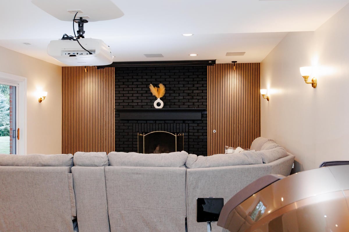 Custom fireplace in basement remodel in North Barrington by Skor Construction