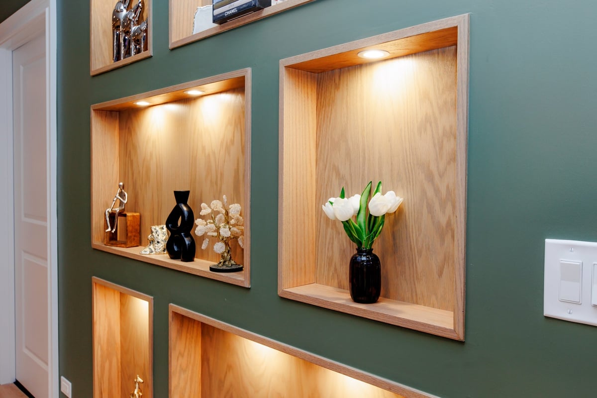 Cut out in green wall in basement remodel in North Barrington by Skor Construction