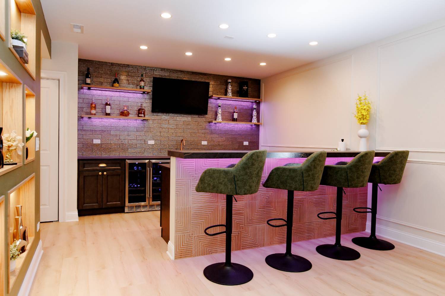 luxury wet bar installation featuring custom cabinetry, stone backsplash, and bar seating by Skor Construction in Palatine, IL.-optimized
