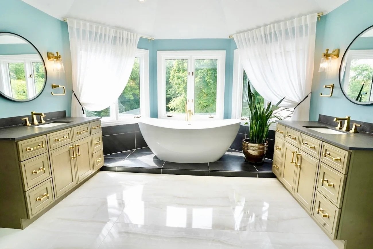 luxurious master bathroom remodeling project in barrington il featuring freestanding soaking tub dual vanities gold fixtures and marble floors by skor construction