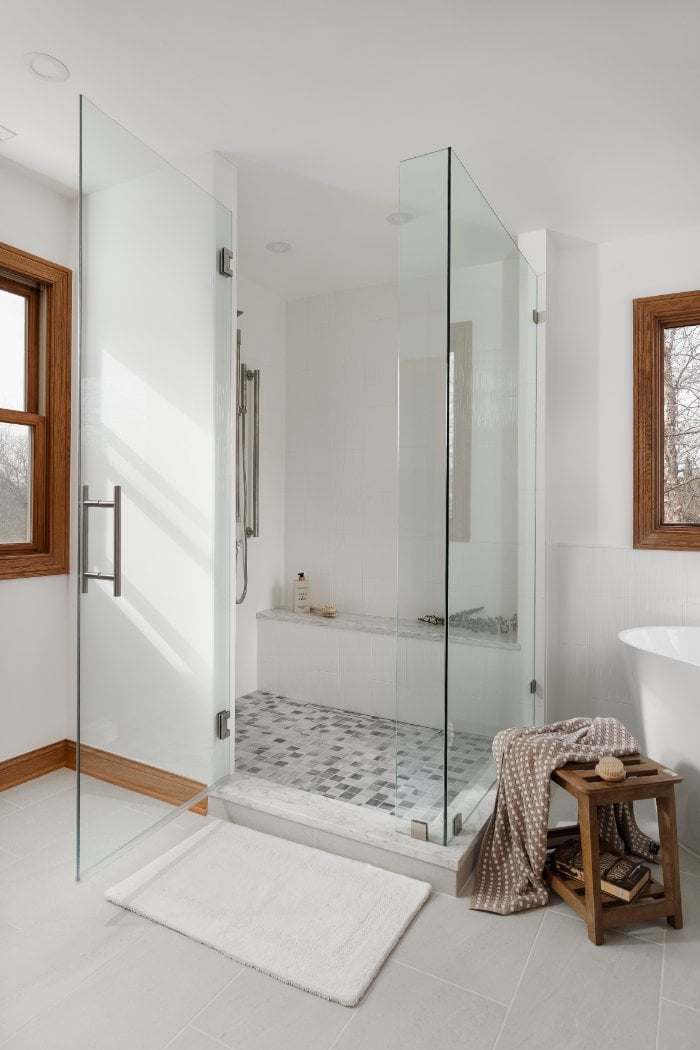 Skor Construction Lauder Primary Bathroom Remodel in Inverness, IL featuring a frameless glass walk-in shower with marble tile f-optimized
