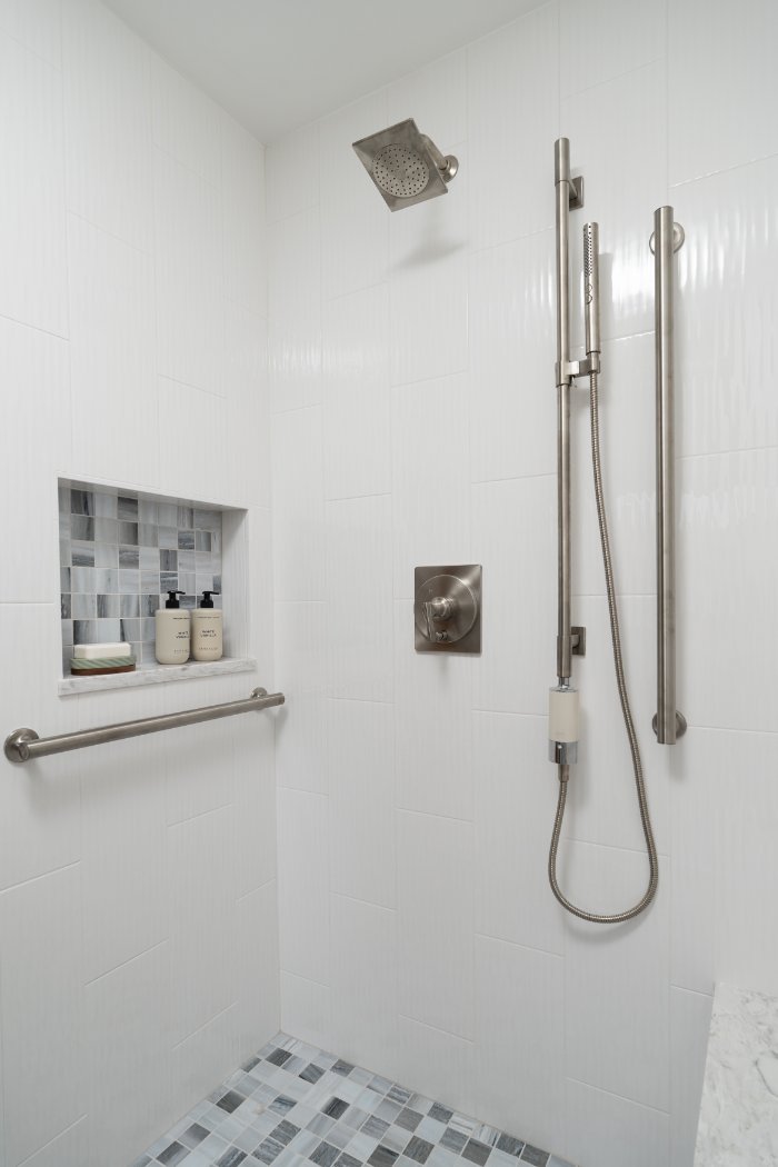 Skor Construction Lauder Primary Bathroom Remodel in Inverness, IL showcasing a modern walk-in shower with brushed nickel fixtur-optimized