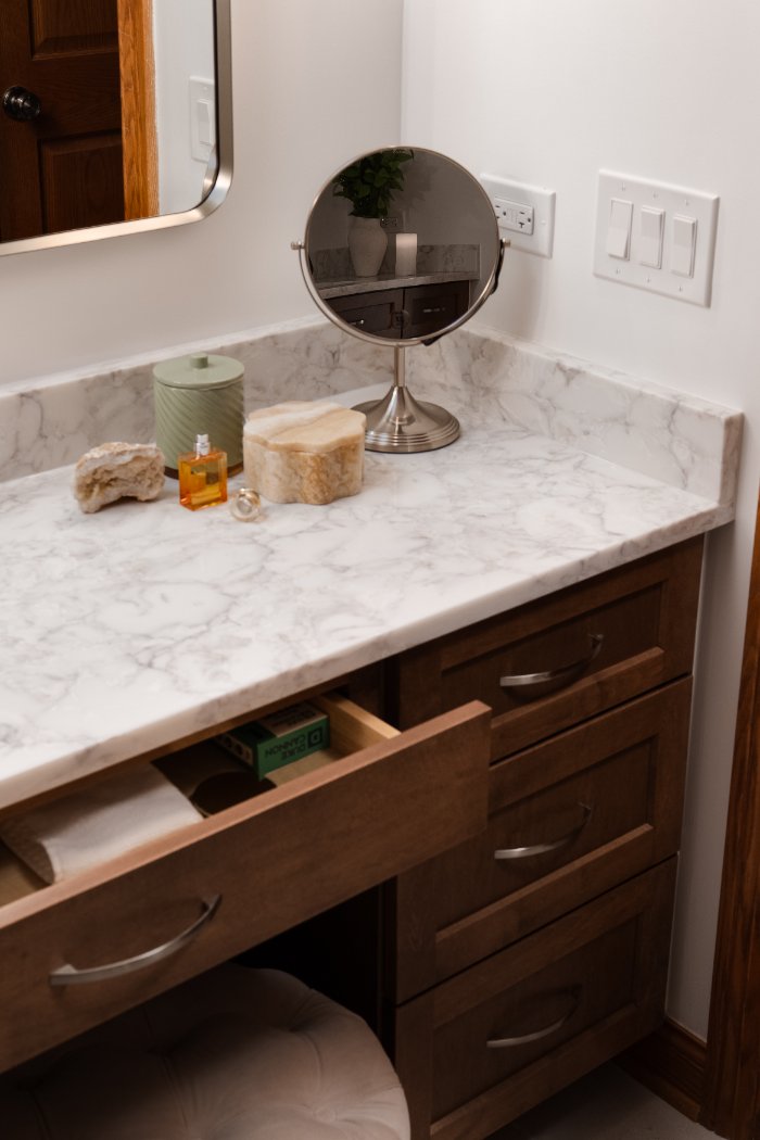 Skor Construction Lauder Primary Bathroom Remodel in Inverness, IL with marble countertop detail and custom vanity storage drawe-optimized