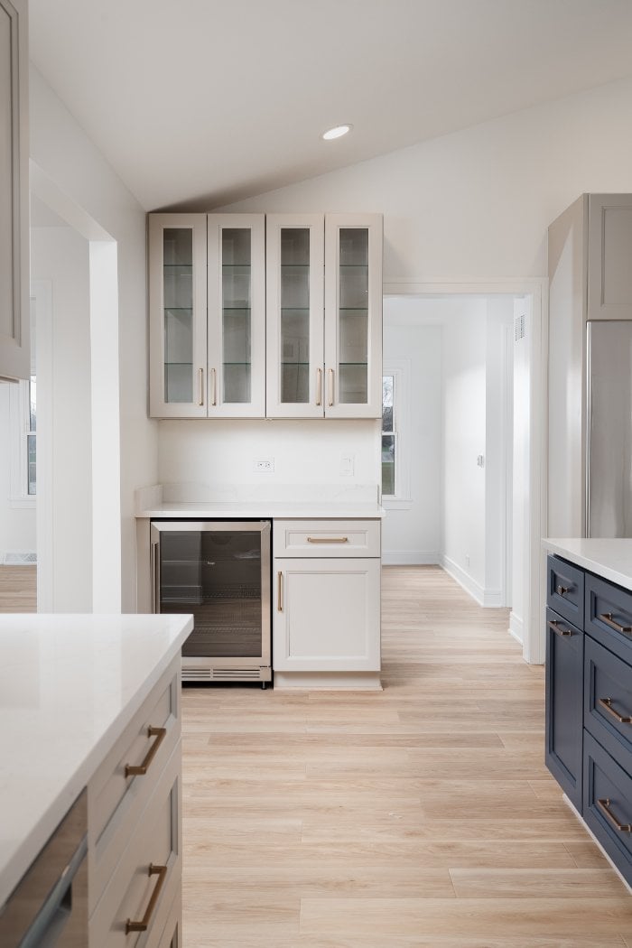 Skor Construction kitchen renovation in Arlington Heights, IL featuring a built-in beverage station with glass-front cabinetry a-optimized